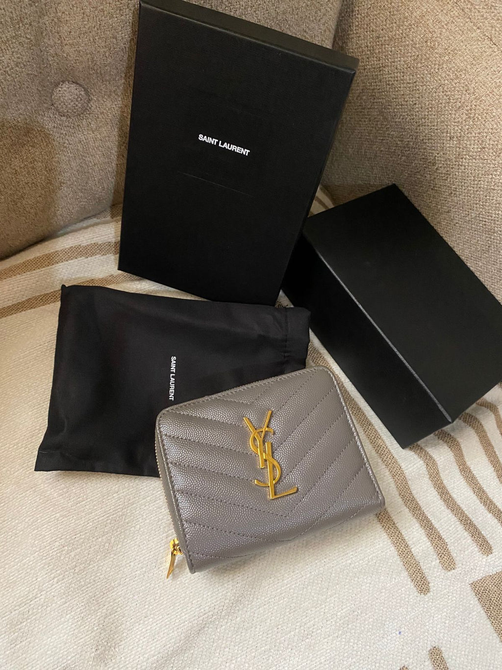 Yves Saint Laurent CASSANDRE MATELASSÉ compact zip around wallet in grain de poudre leather