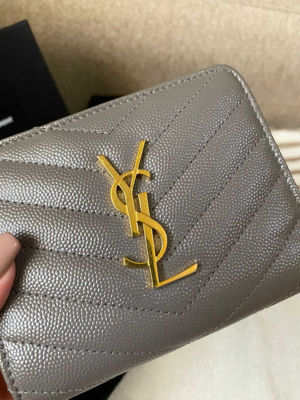 Yves Saint Laurent CASSANDRE MATELASSÉ compact zip around wallet in grain de poudre leather