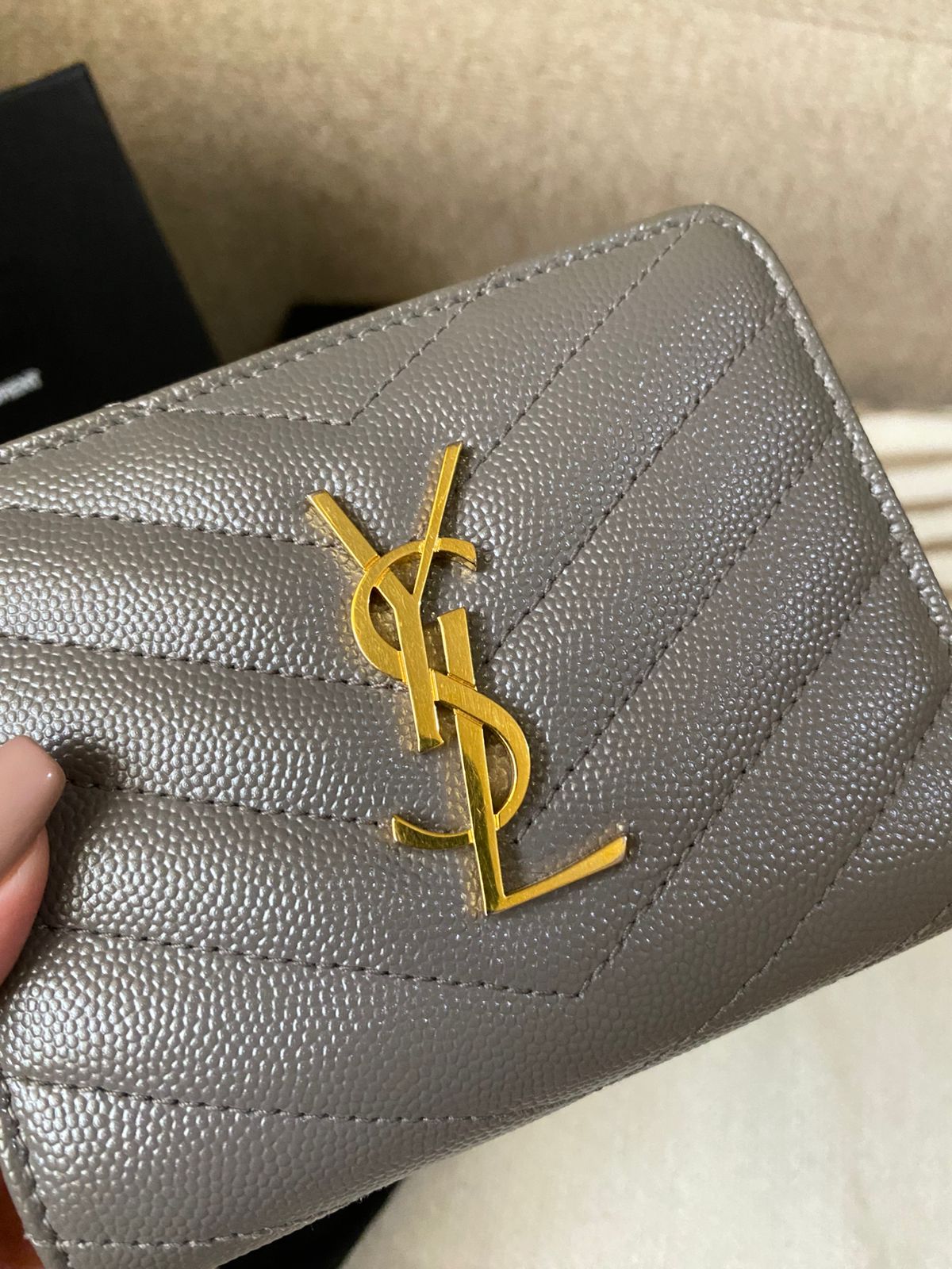 Yves Saint Laurent CASSANDRE MATELASSÉ compact zip around wallet in grain de poudre leather