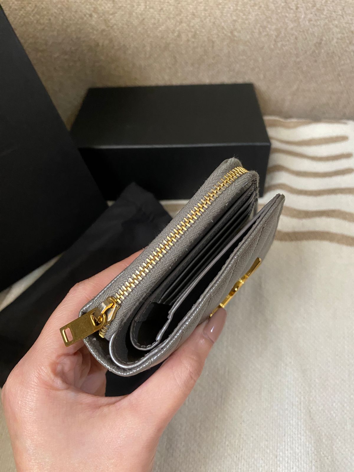 Yves Saint Laurent CASSANDRE MATELASSÉ compact zip around wallet in grain de poudre leather