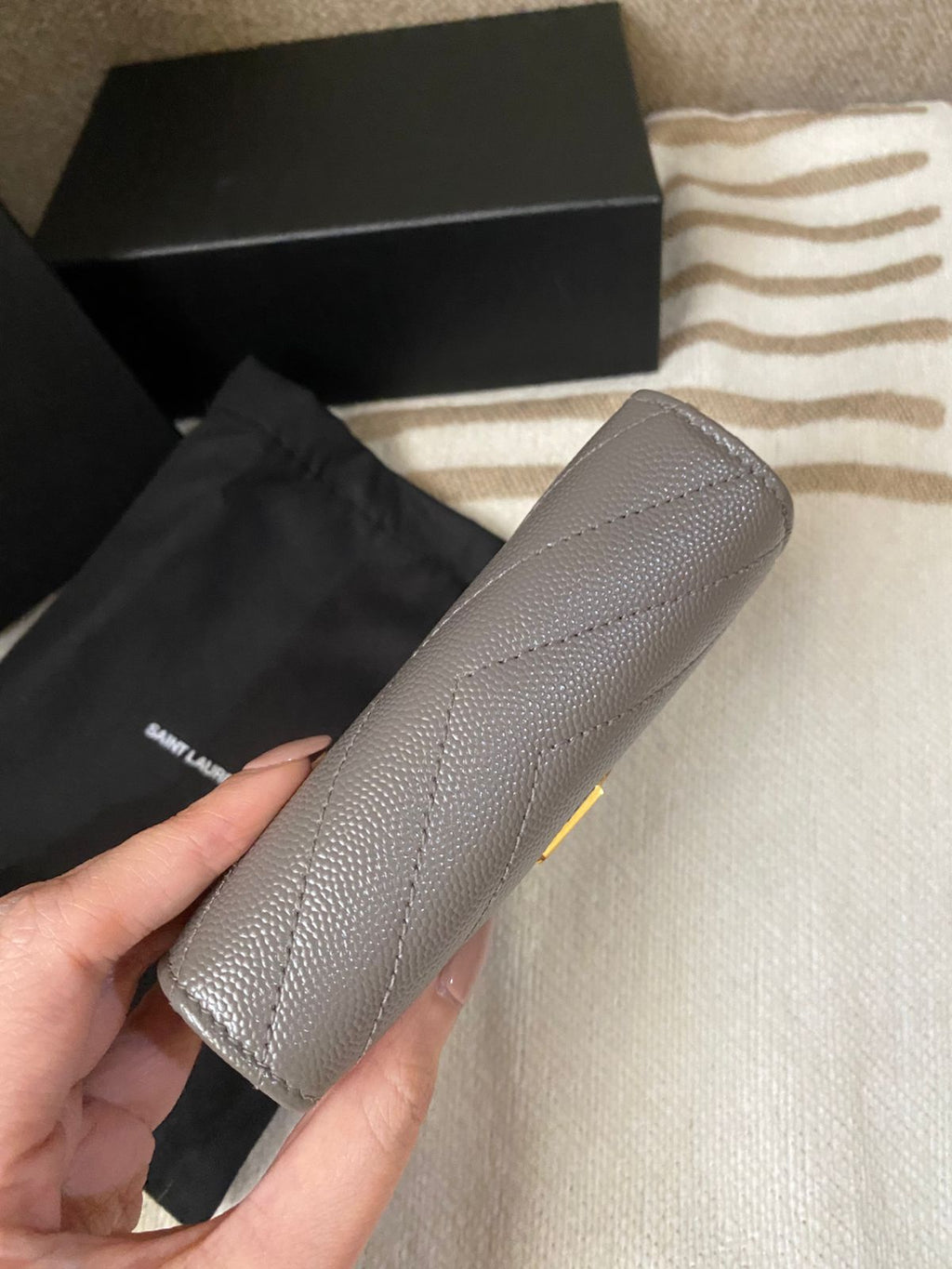 Yves Saint Laurent CASSANDRE MATELASSÉ compact zip around wallet in grain de poudre leather