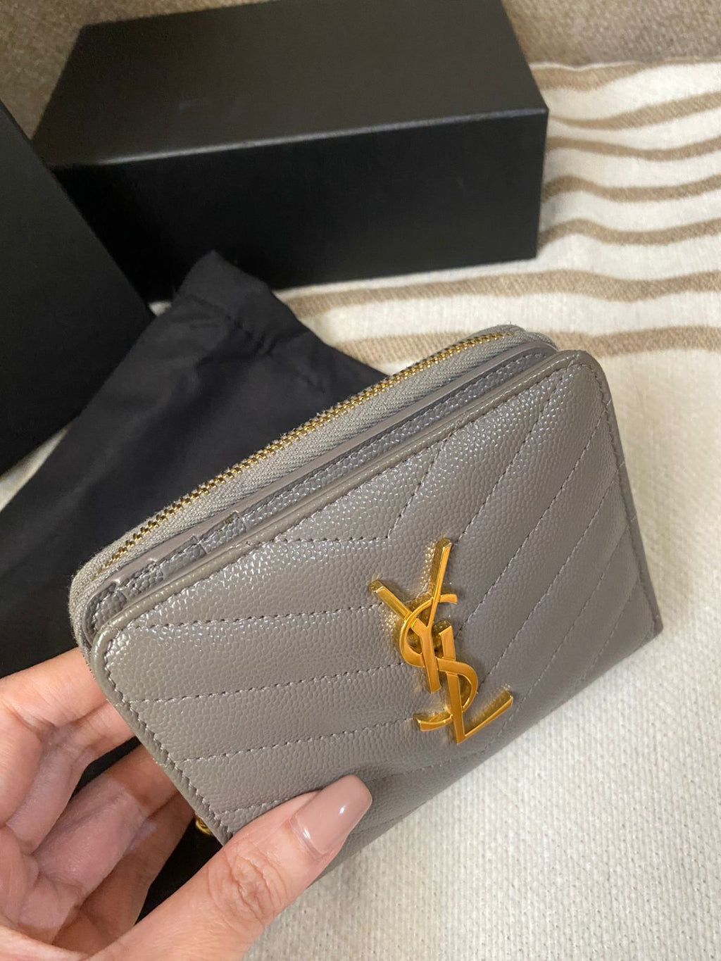 Yves Saint Laurent CASSANDRE MATELASSÉ compact zip around wallet in grain de poudre leather