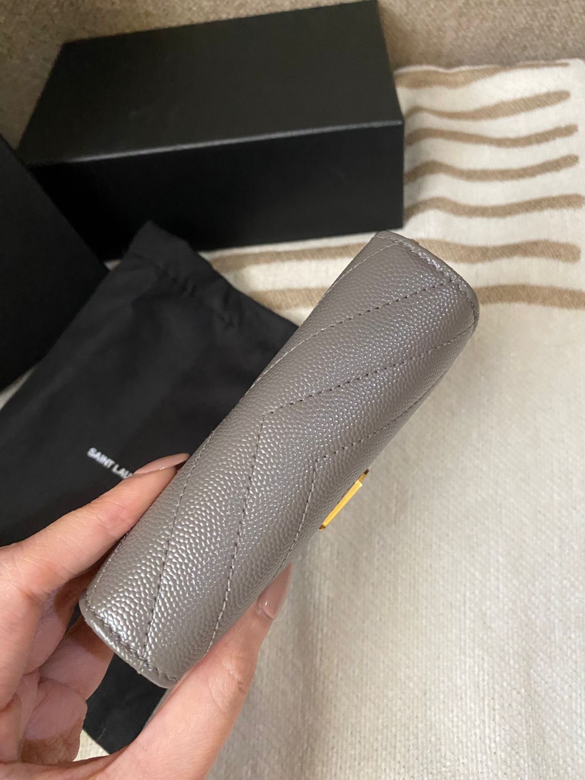 Yves Saint Laurent CASSANDRE MATELASSÉ compact zip around wallet in grain de poudre leather