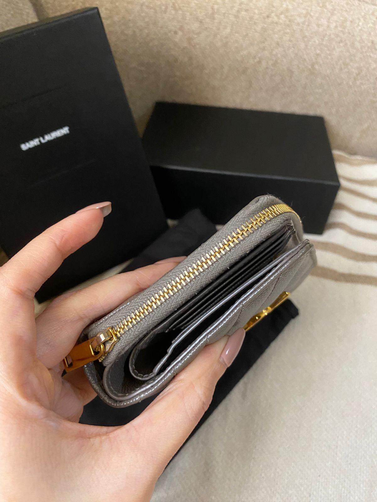 Yves Saint Laurent CASSANDRE MATELASSÉ compact zip around wallet in grain de poudre leather